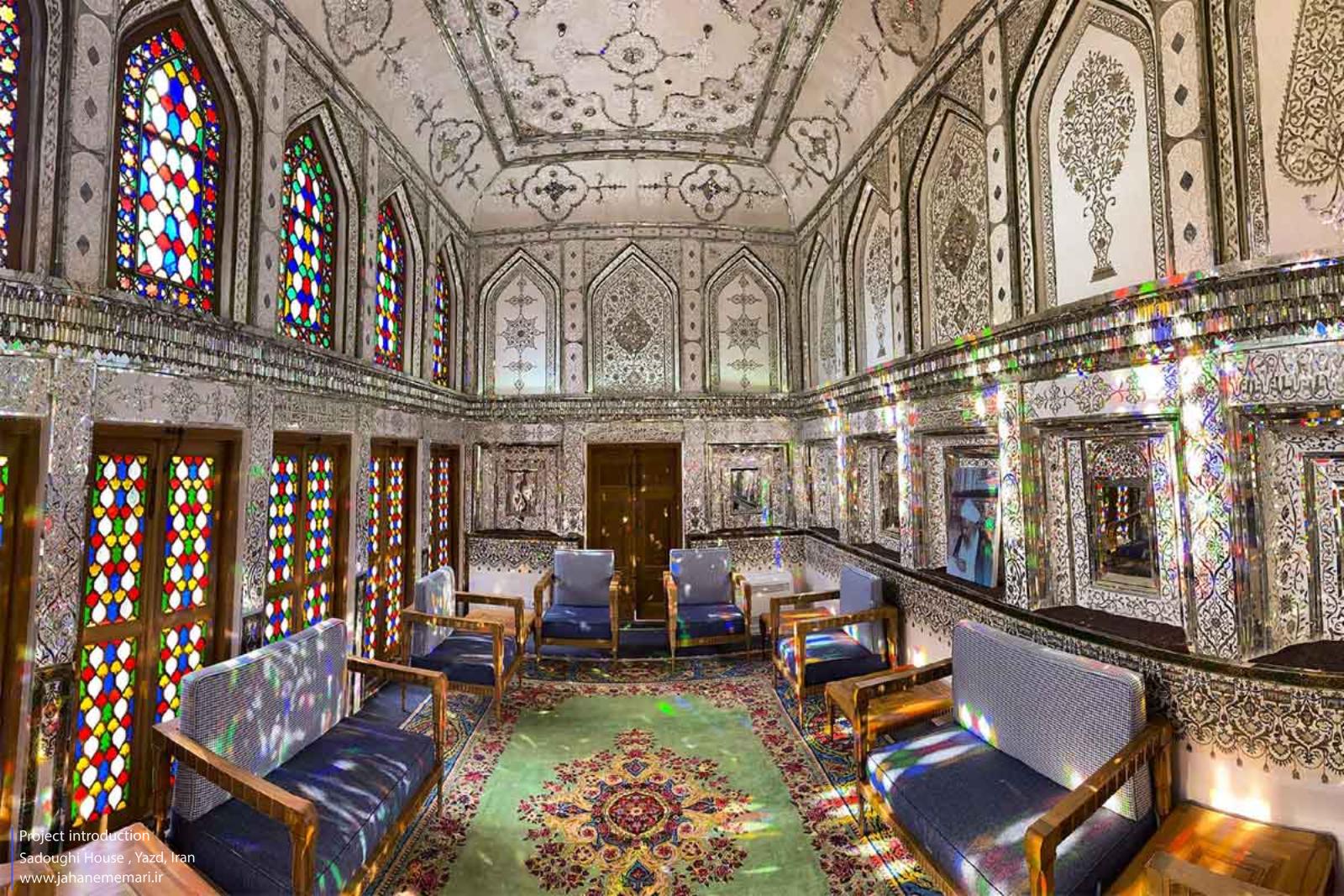 Natural light passing through stained glass into the mirror room of Sadoughi House in Yazd